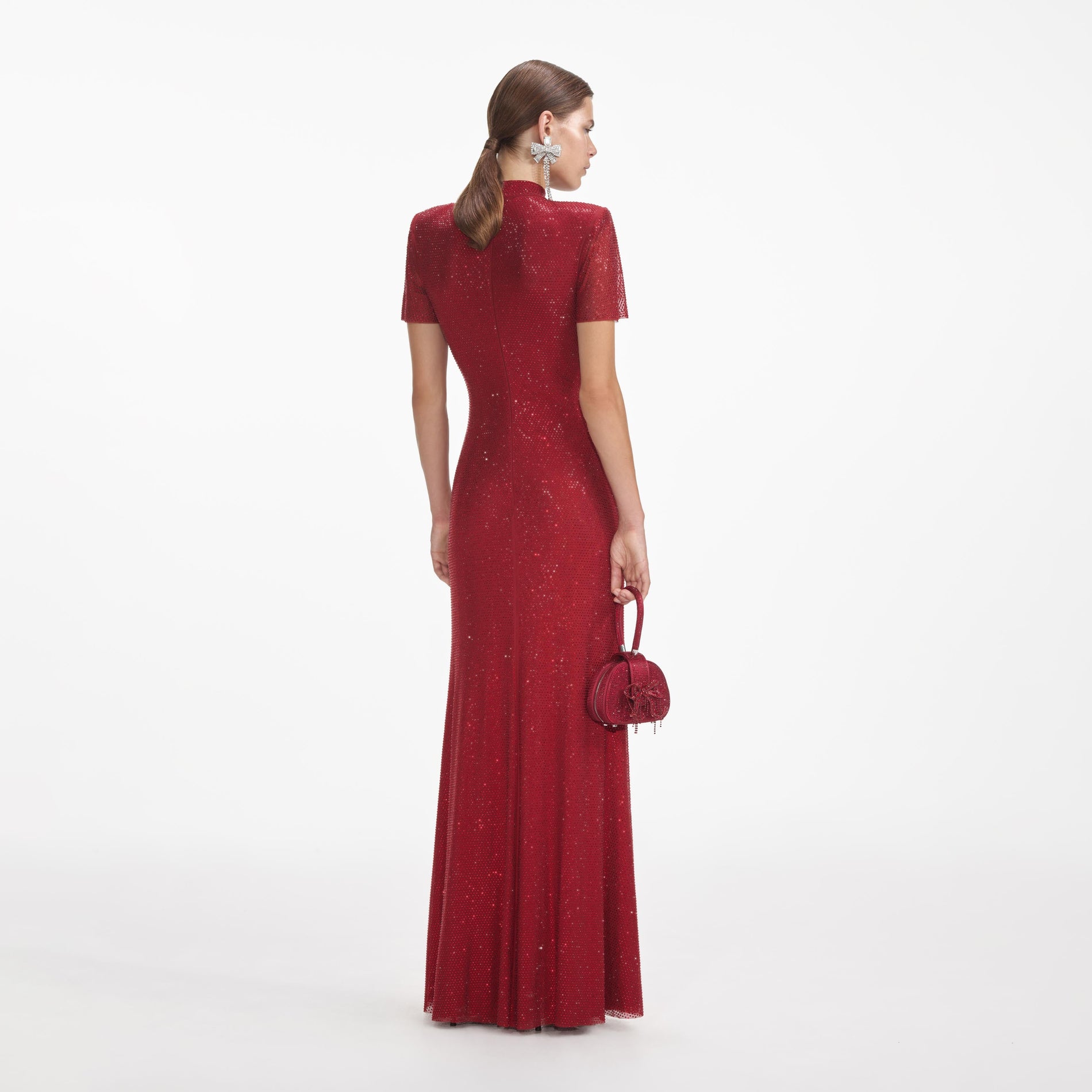 Back view of a woman wearing the Red Rhinestone Mesh Maxi Dress