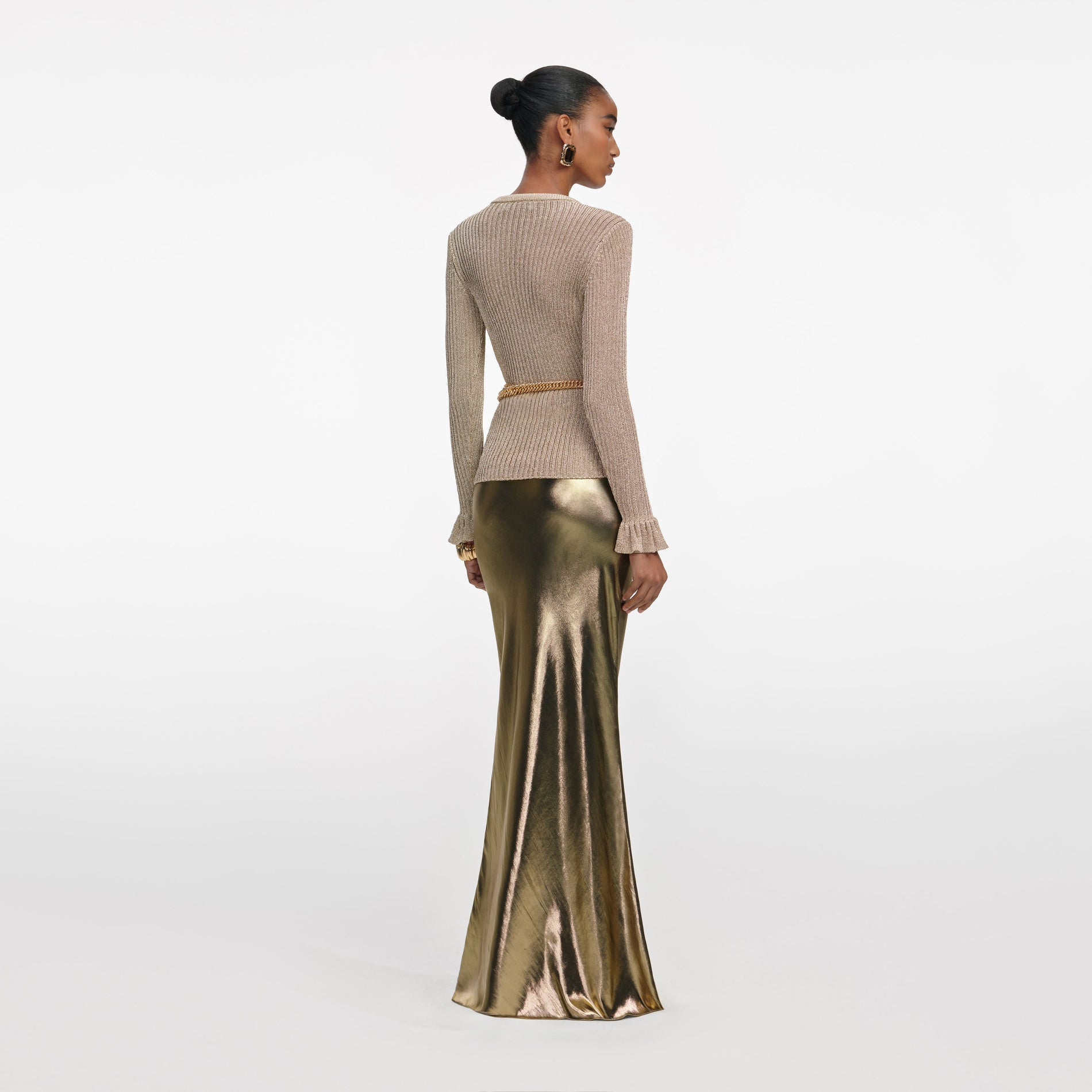 Back view of a woman wearing the Gold Lurex Ribbed Knit Top