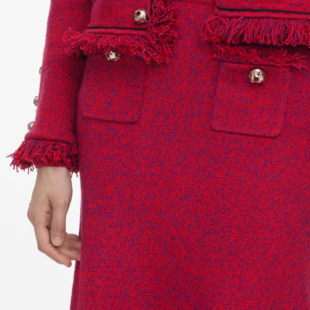 A close up of the fabric for the Red Frayed Knit Midi Skirt