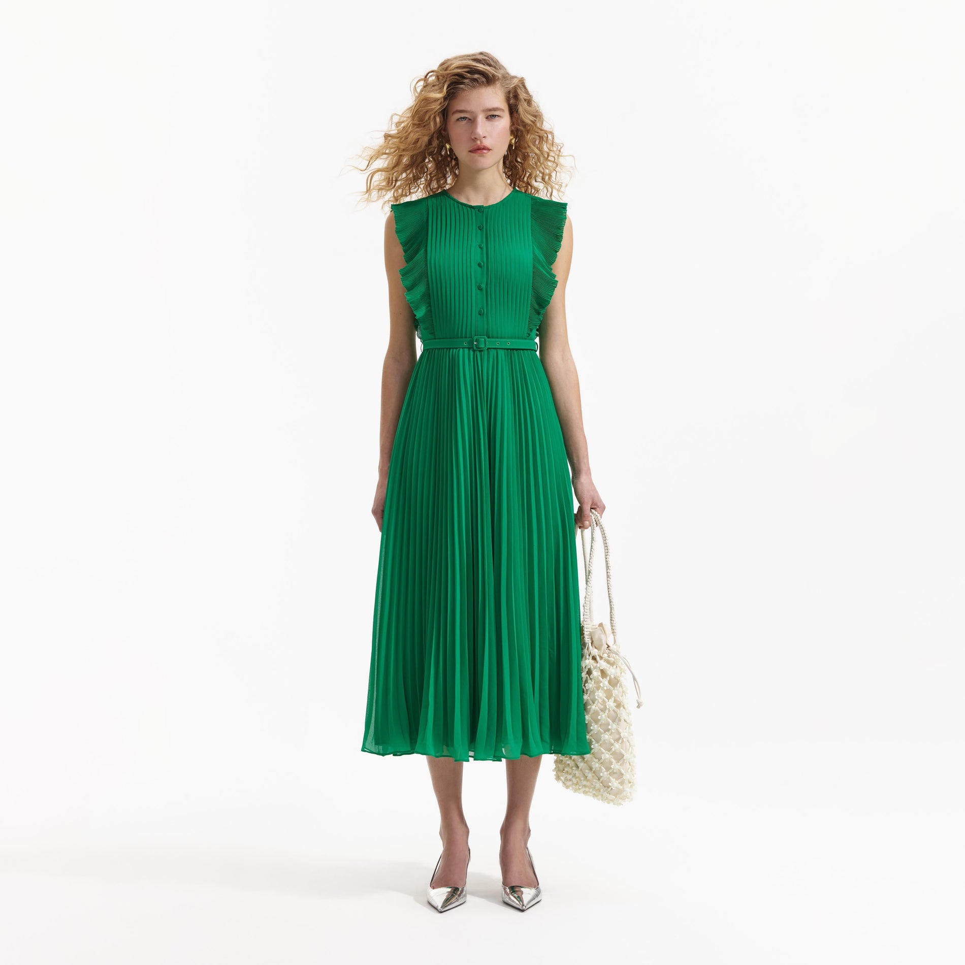 Front view of a woman wearing the Green Chiffon Sleeveless Ruffle Midi Dress