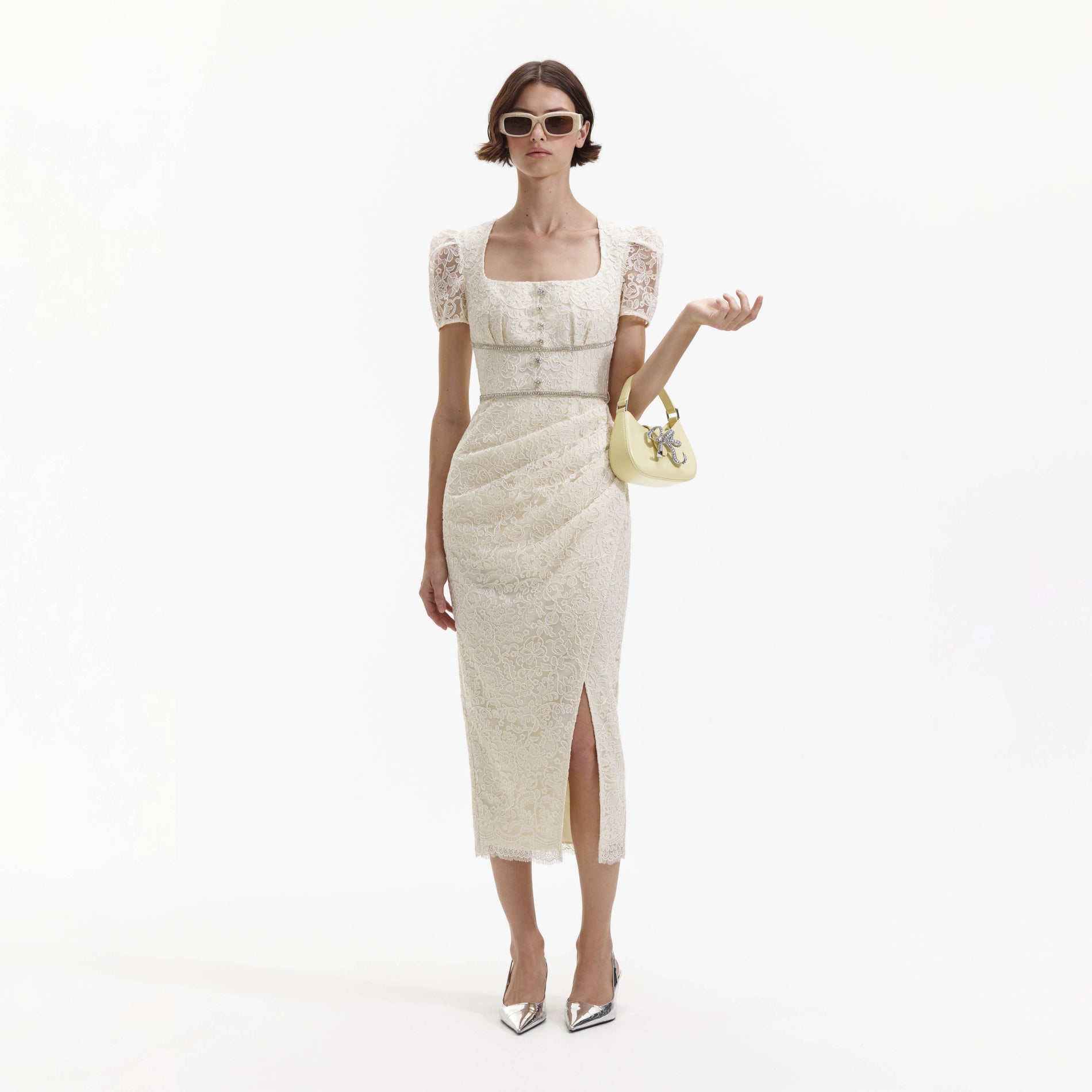 Front view of a woman wearing the Cream Lace Diamante Midi Dress