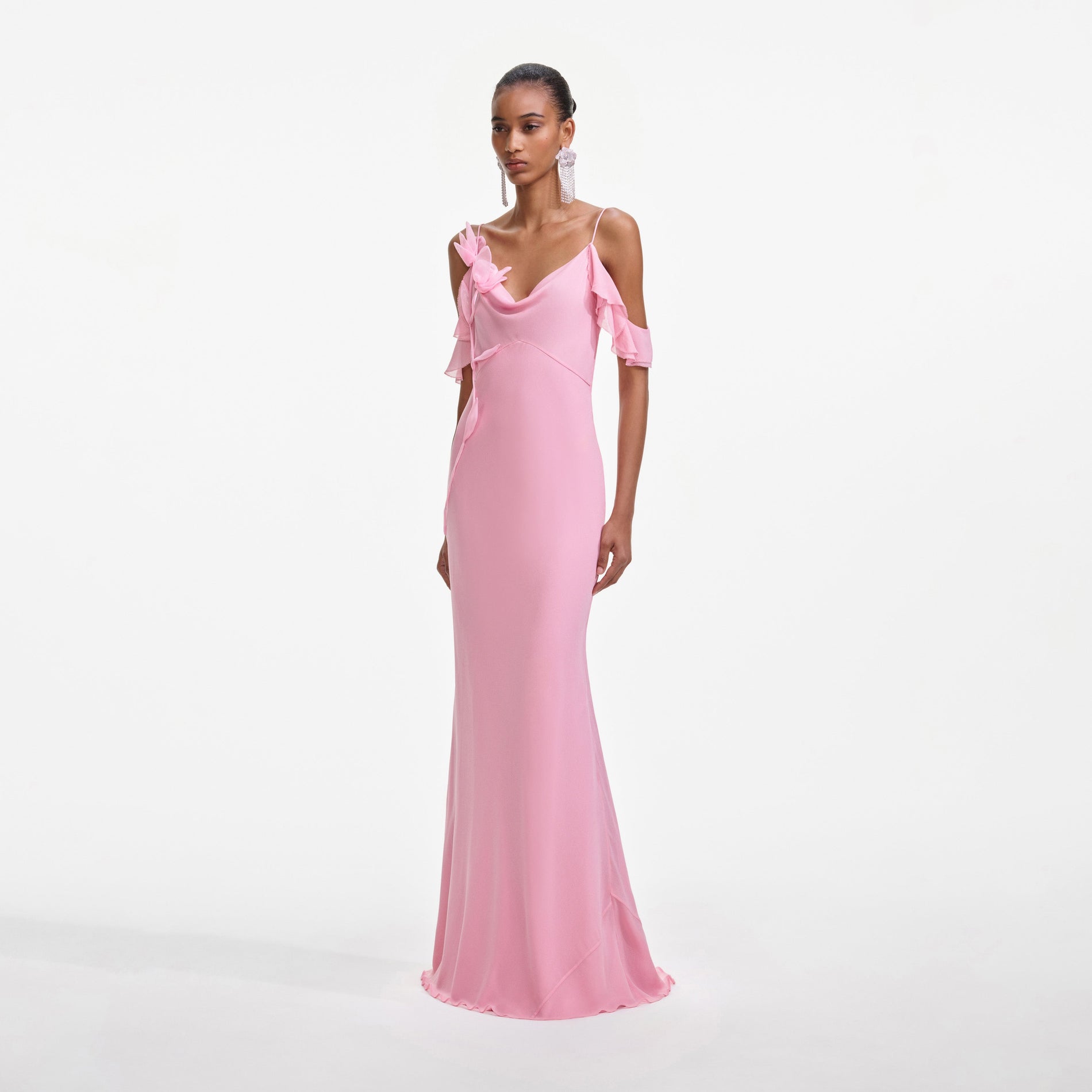 Side view of a woman wearing the Pink Georgette Flower Maxi Dress