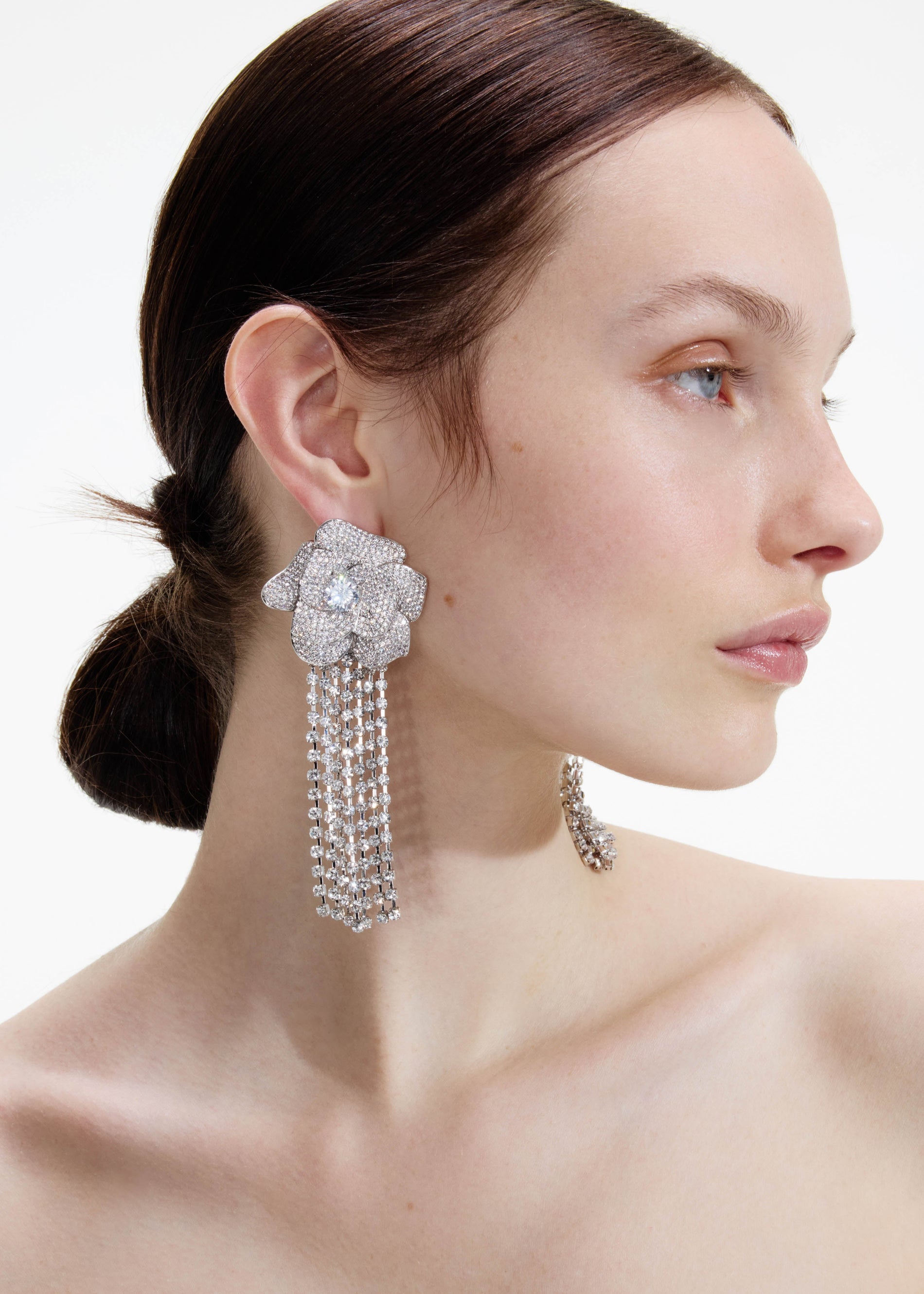 A photo of the Crystal Flower Droplet Earrings