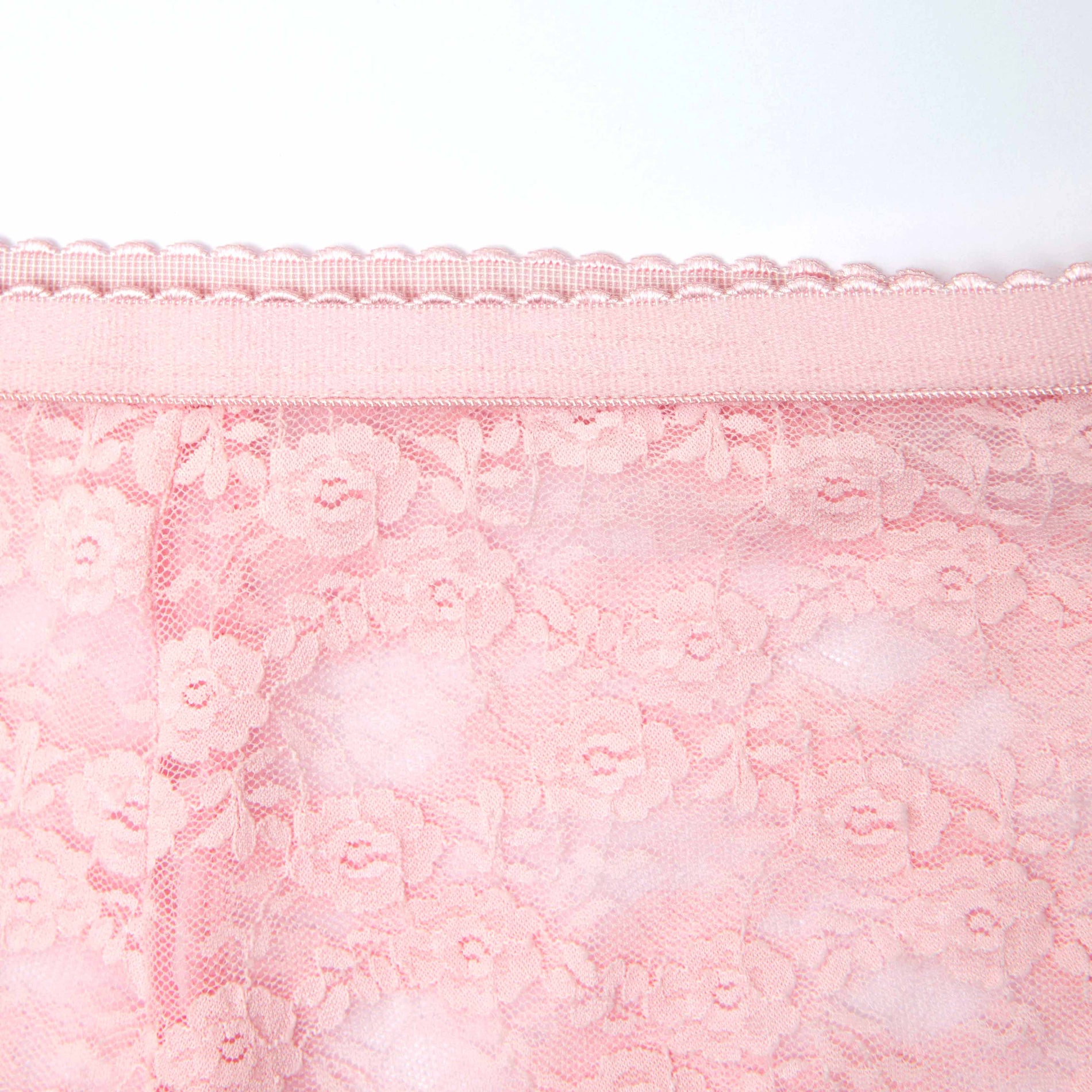 A close up of a woman wearing the Pink Lace Tights