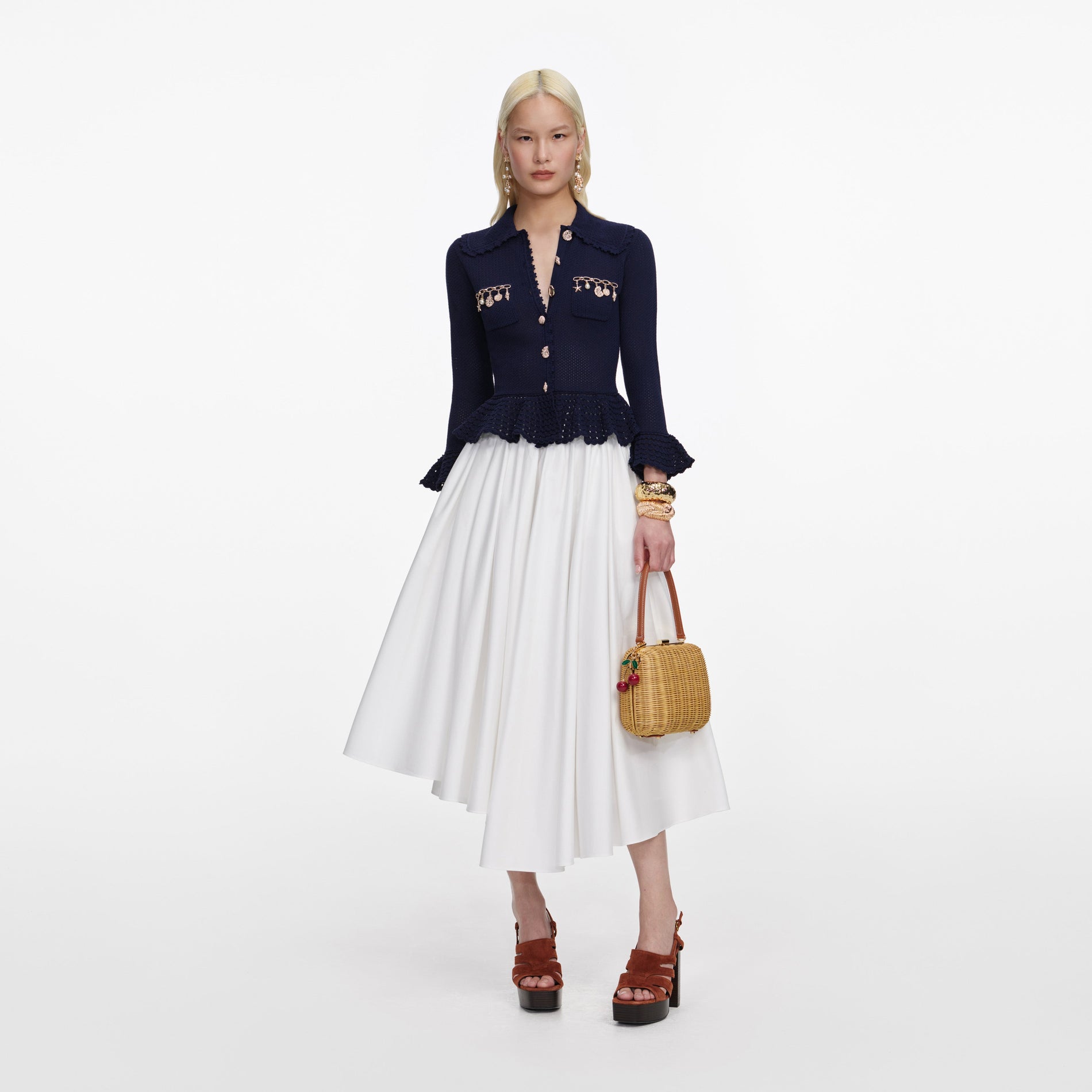 Front view of a woman wearing the Navy Shell Embellished Cardigan