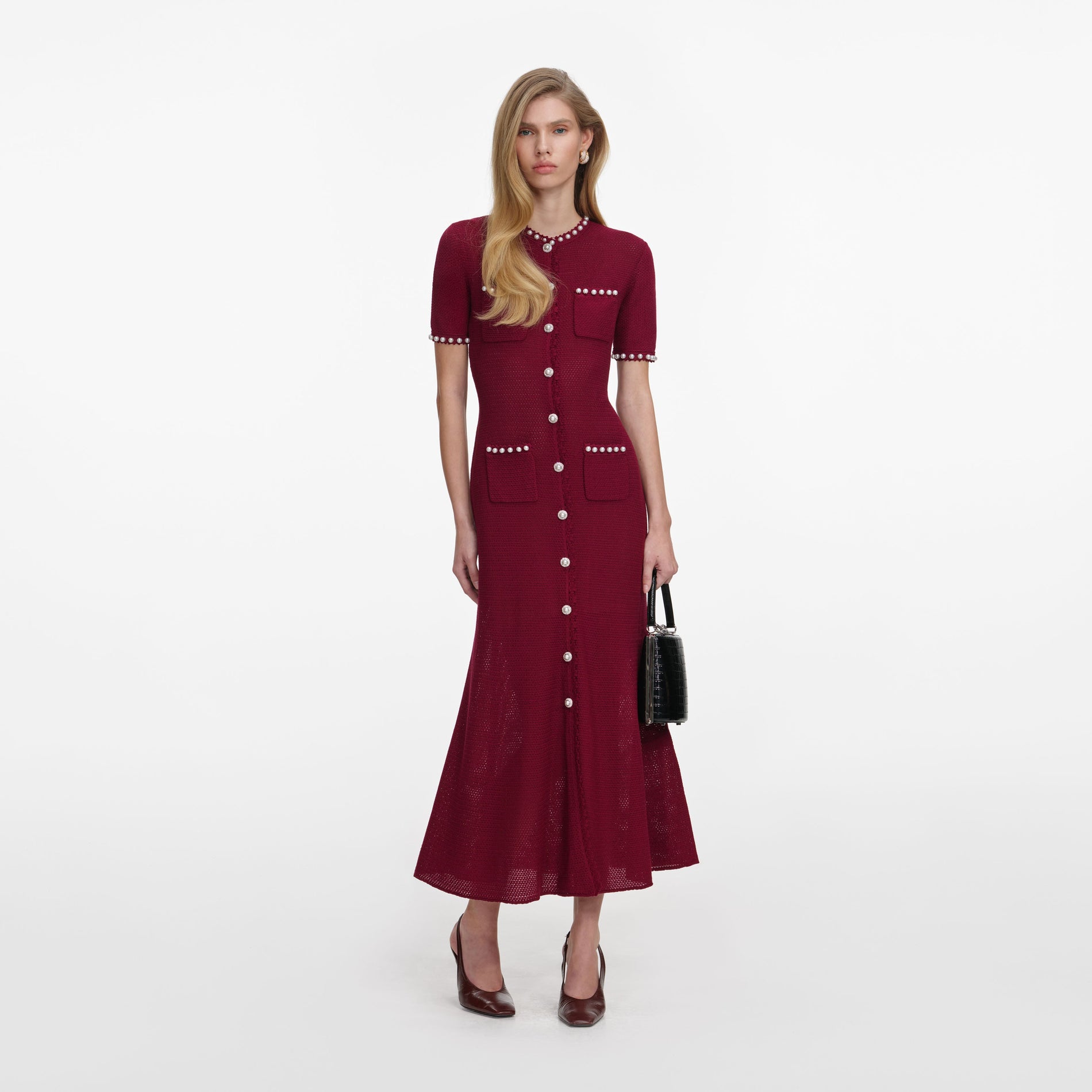 Front view of a woman wearing the Burgundy Pearl Knit Midi Dress