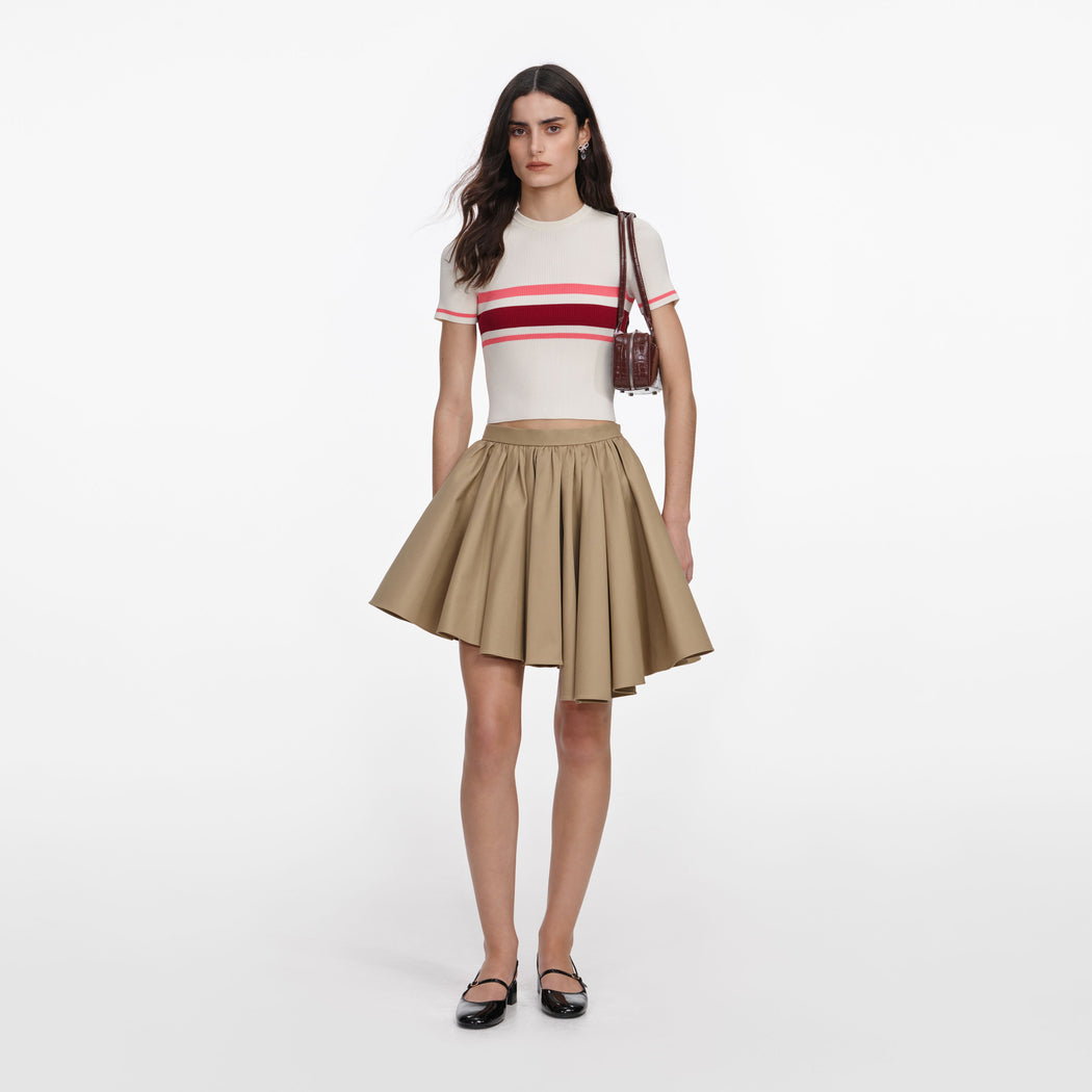 Front view of a woman wearing the Cream Stripe Viscose Knit Top