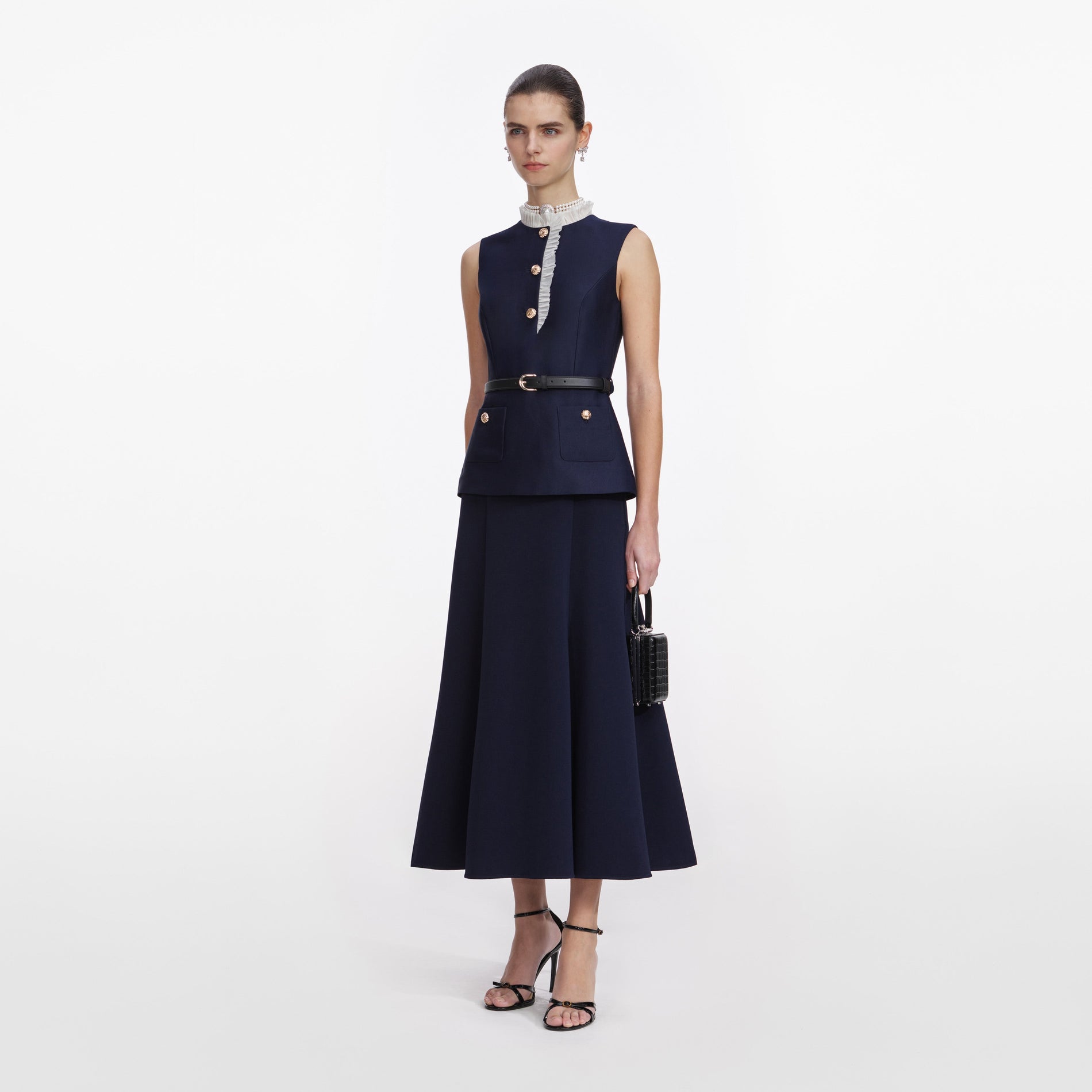 Side view of a woman wearing the Navy Taffeta Contrast Frill Midi Dress