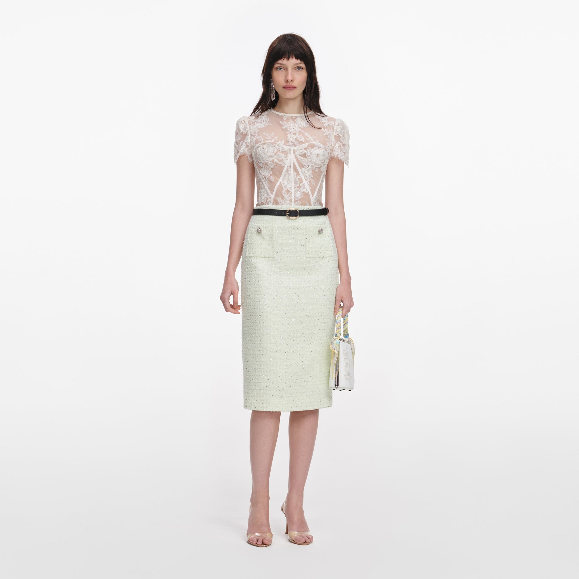 Front view of a woman wearing the Cream Sequin Lace Top