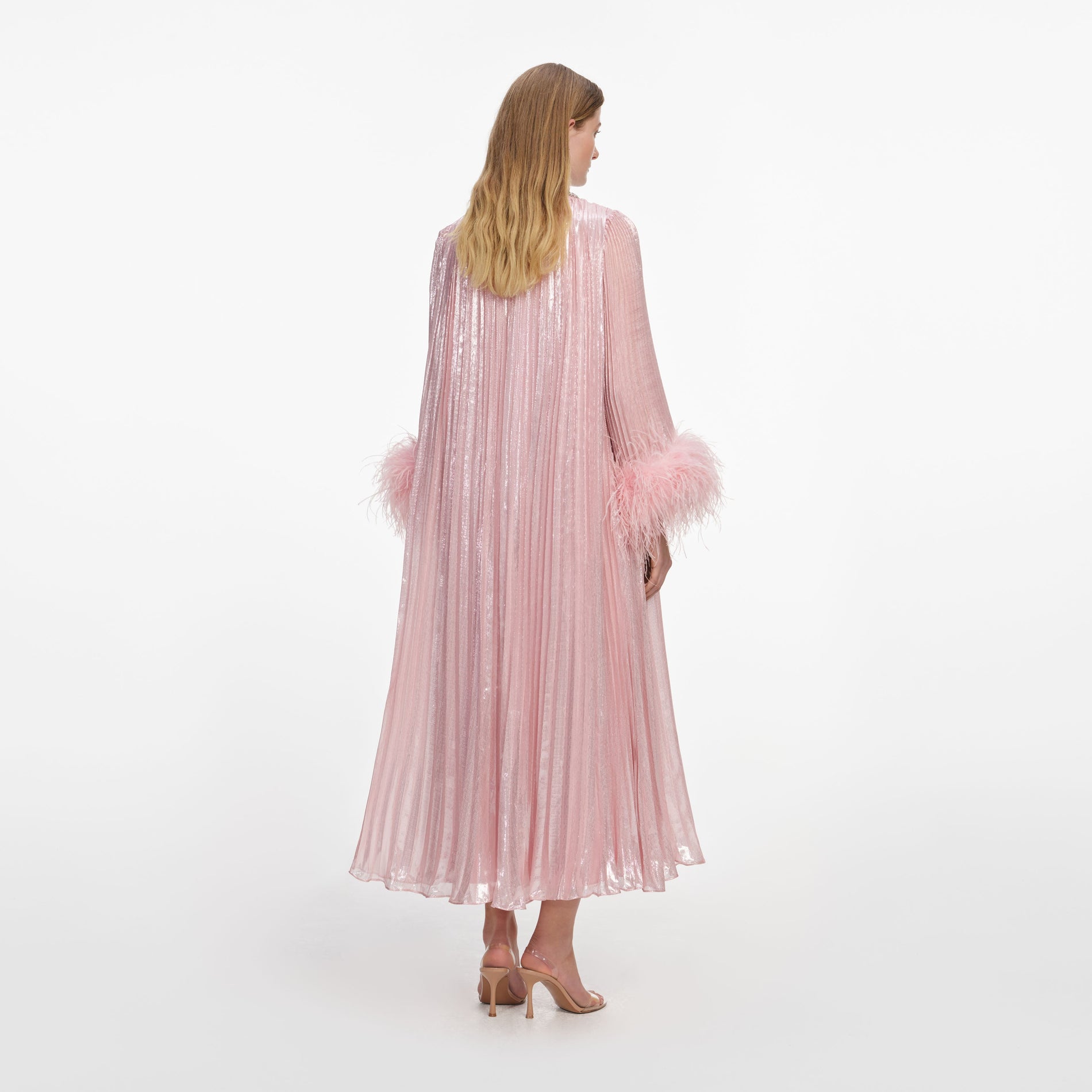 Back view of a woman wearing the Pink Metallic Chiffon Feather Midi Dress