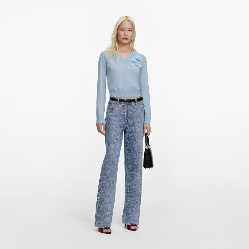Front view of a woman wearing the Blue Rose Wool Jumper