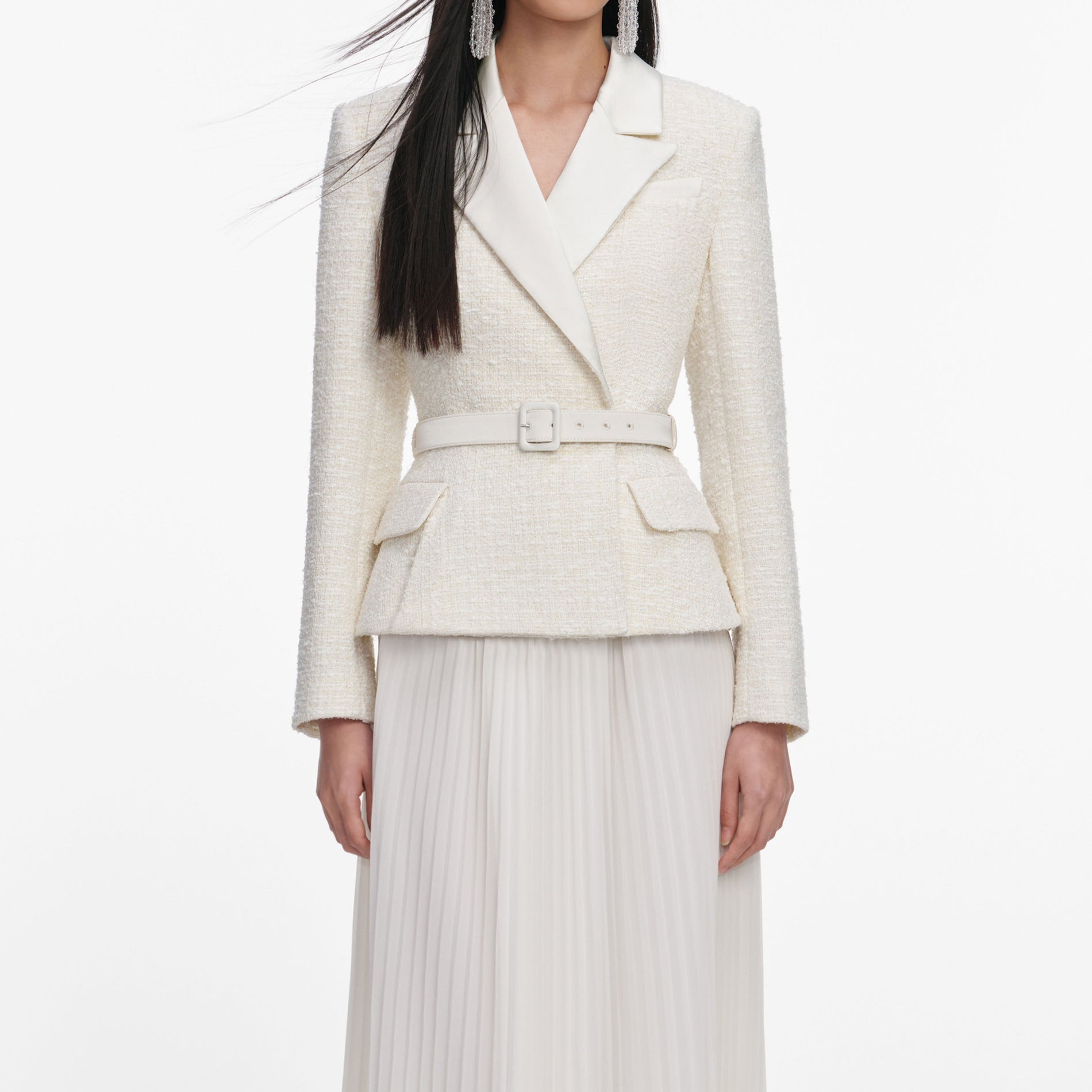 A close up of a woman wearing the Cream Tailored Boucle Chiffon Maxi Dress